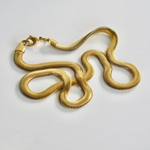 Snake chain, herringbone in 316L stainless steel and plated with 18K fine gold