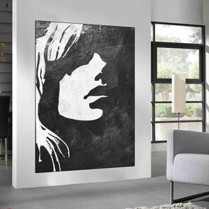 Neutral abstract wall art in living room setting