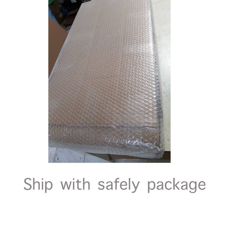May include: A brown cardboard box wrapped in bubble wrap for safe shipping.