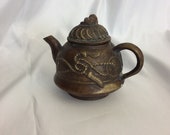 Antique Chinese single serve teapot with monkey finial