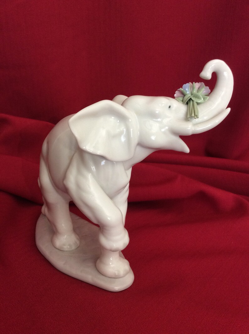 lladro elephant with riders