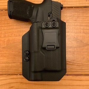 Sig Sauer P320c with TLR-1 light inside waistband (IWB) kydex holster