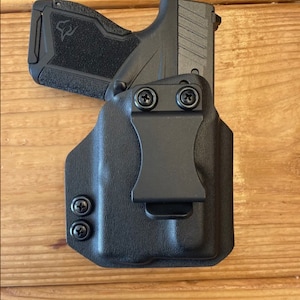 Inside the waistband Kydex holster for the Taurus GX4 with TLR6. Adjustable retention