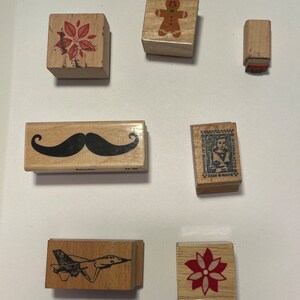 Lote de 7 selos de variedades *USADOS* Bigode Flores Avião Ginberbread Man