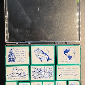 12 Stempel *GEBRAUCHT* Delfine - Welt - Baum - Blumen - Schmetterling - Sonne - Schildkröte - Vogel - Muschel - Wale - Botschaften