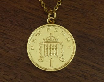 Collar con moneda chapada en oro de un centavo de 1976