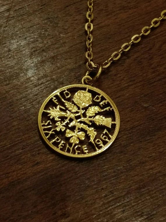 Ciondolo con moneta floreale da sei pence del 1961, regalo
