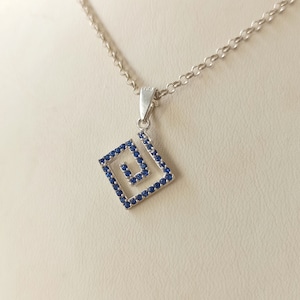Sterling Silver Meander Pendant with Zircon Stones