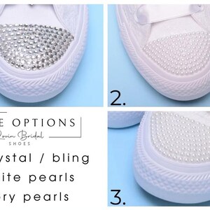 May include: Three close-up images of white canvas shoes with different toe embellishments. The first shoe has a crystal bling toe, the second has white pearls, and the third has ivory pearls. The text "TOE OPTIONS" is displayed above the images, with the brand name "Lovin Bridal SHOES" below it. The options are listed as "1. Crystal / bling", "2. White pearls", and "3. Ivory pearls".