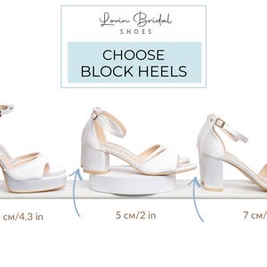 May include: Three pairs of white block heel bridal shoes are displayed. The heels measure 4.3 inches, 2 inches, and 2.75 inches. The shoes have ankle straps and are on a white surface.