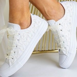 Elegant lace-adorned Luxury White Wedding Converse, a perfect choice for the bride. Personalized Bridal Low top Tennis Shoes featuring exquisite Dubai Lace, combining comfort and style for the special day
