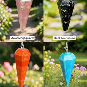 May include: A collection of four gemstone pendulums. The pendulums are strawberry quartz, black tourmaline, red jasper, and blue turquoise. Each pendulum is faceted and suspended from a silver chain. The names of the stones are written below each pendulum.