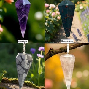 May include: Four gemstone pendulums: amethyst, bloodstone, snowflake obsidian, and smoky quartz. Each pendulum is suspended by a silver chain. The amethyst is purple, the bloodstone is dark green with red spots, the snowflake obsidian is gray, and the smoky quartz is translucent.