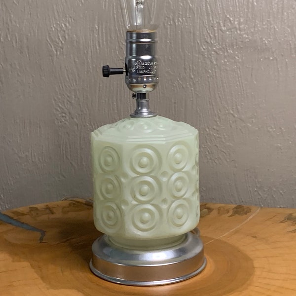 Antique table lamp. Green glass. Art Deco style.