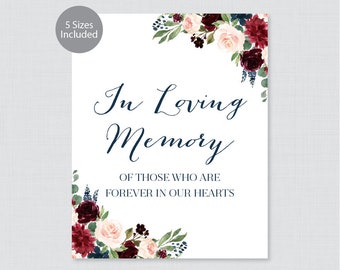 May include: A printable sign with a floral border in shades of burgundy, blush pink, and navy blue. The text reads "In Loving Memory of those who are forever in our hearts".