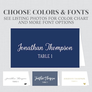 May include: A navy blue place card with white text that reads "Jonathan Thompson" and "Table 1". Three additional place cards are shown in the background, one with a cow icon, one with a gray background, and one with a gold bird icon.