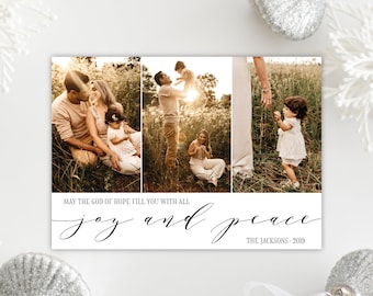 May include: A holiday card featuring three family photos with a warm, golden hue. The card includes the text "May the God of Hope fill you with all joy and peace" and "The Jacksons 2019". Silver ornaments and white accents surround the card.