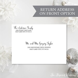 May include: A white envelope with black calligraphy text. The text includes a family name and address, and the names and address of Mr. and Mrs. Gregory Taylor. The top of the envelope has a gray banner that reads "RETURN ADDRESS ON FRONT OPTION".