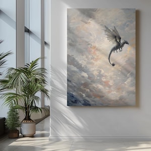 May include: A canvas print of a dragon soaring through a cloudy sky. The dragon is gray with large wings, and the background features shades of blue, white, and peach. The artwork is displayed on a white wall.
