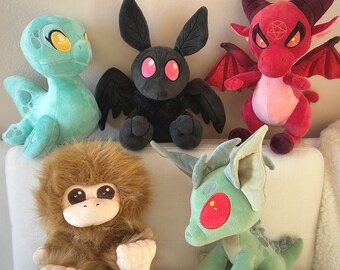 Cryptid Collection Plushies + Pins!