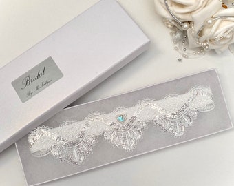 Wedding Garter, Shining Sequin Lace with Iridescent Blue Heart. Gift boxed.