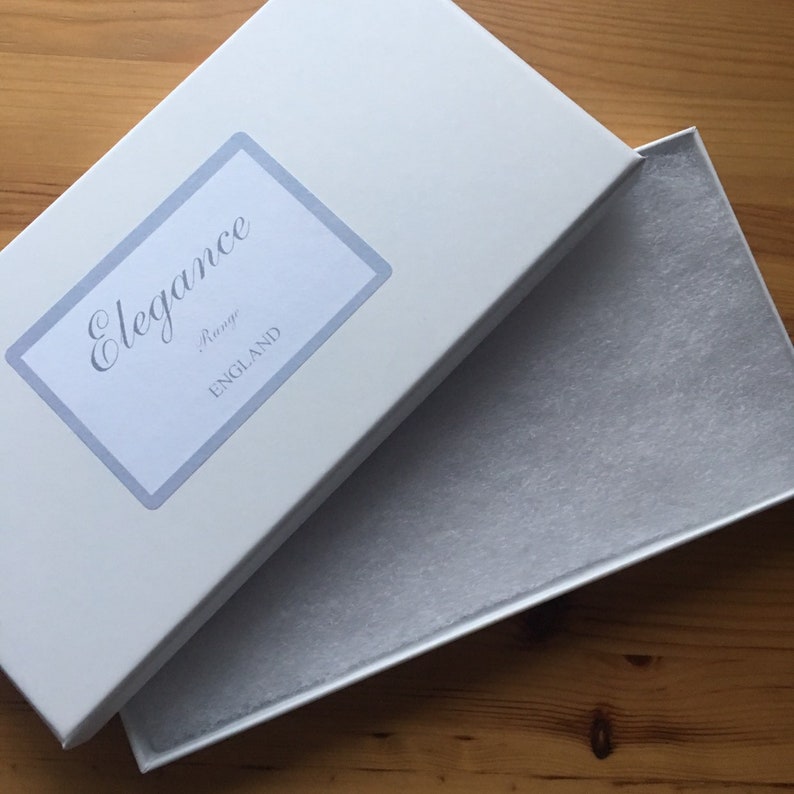 light blue and ivory available in SM /& Plus sizeLarge Something Blue Wedding Garter