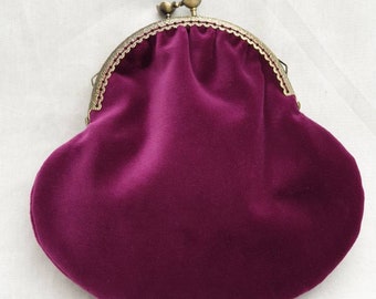 cadbury purple clutch bag