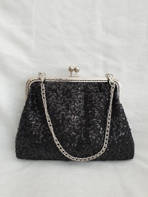 black sparkly clutch