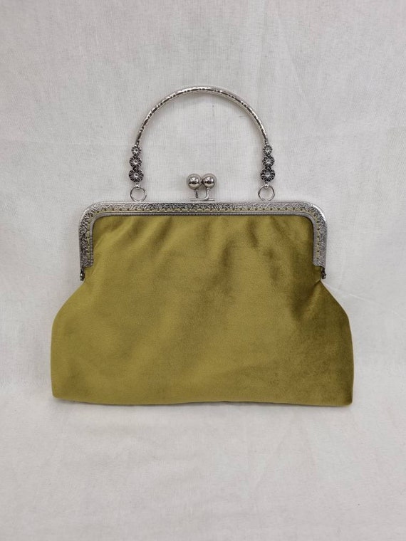 Olive green triangular shaped Khunn sling purse with wooden flower but –  Soyara Ethnics Studio