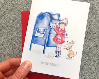 May include: A girl in a red coat and white hat is putting a letter in a blue mailbox with a dog standing next to her. The mailbox says "United States Postal Service". The card says "Happy Valentines Day!"