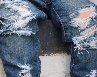 kids cut up jeans