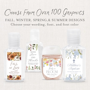 May include: Four hand sanitizer bottles with custom labels. The labels feature floral and seasonal designs, including fall pumpkins, winter greenery, spring blooms, and summer flowers. Text on the labels includes "Fall in Love," "With Love and Thanks," "Baby in Bloom," and "Matthew's Baptism."