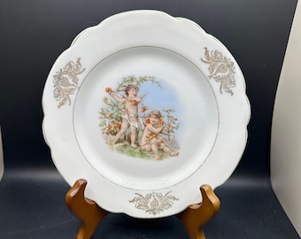 Choice porcelain cherub plates