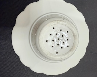 Vintage porcelain tea strainer
