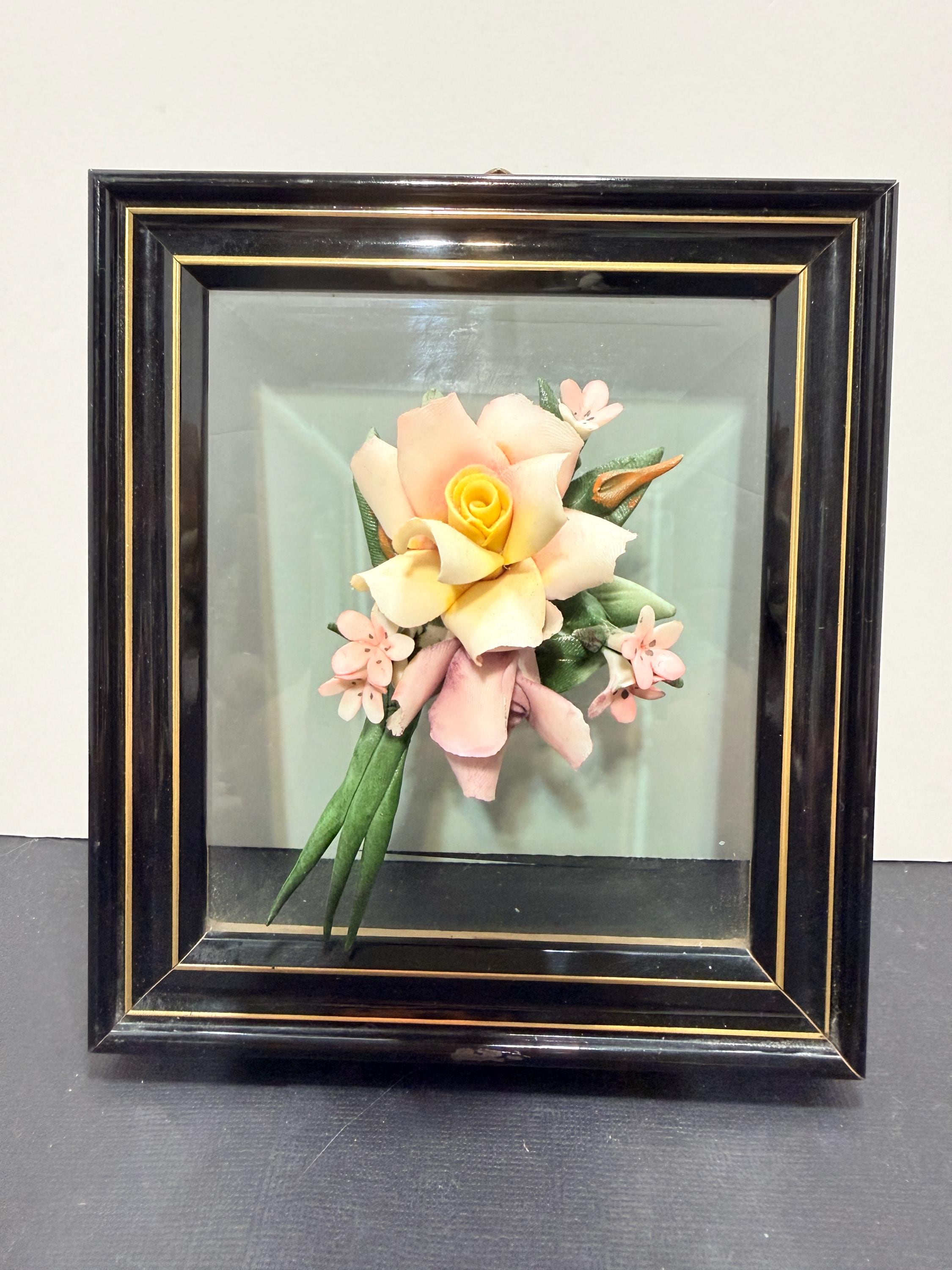 Porcelain floral bouquet on glass frame