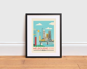 May include: A framed print of a city skyline with the text "MELBOURNE VICTORIA AUSTRALIA" at the bottom. The skyline is a colorful illustration of buildings and a bridge over a body of water.