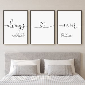 Könnte beinhalten: Drei schwarze gerahmte Drucke mit weißen Hintergründen und schwarzem Text. Der erste Druck sagt "always kiss me goodnight". Der zweite Druck hat eine einfache Herzform, die mit einer Linie gezeichnet ist. Der dritte Druck sagt "never go to bed angry".