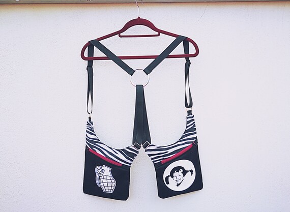 Zippers only available in black (non-burgundy). Carves 2 pockets 4 regulators Zebra fabric with textile vinyl appliques