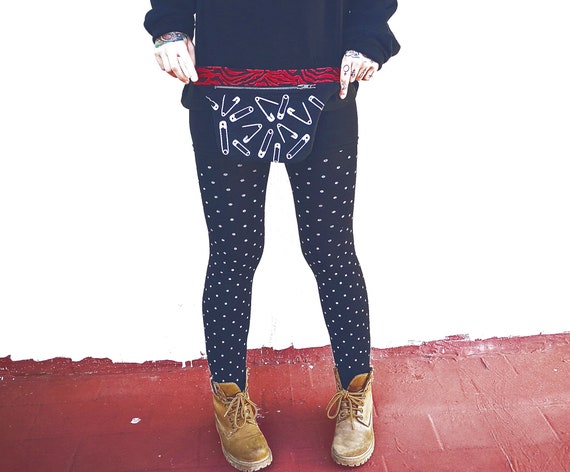1 pocket pocket with metal zipper. Handcrafted print of must-haves and zebra of various colors.