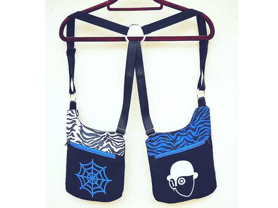 Cartridge strips Holsterbags 2 zippered bags white and blue zebra with screen printing of cobweb and orange mechanics