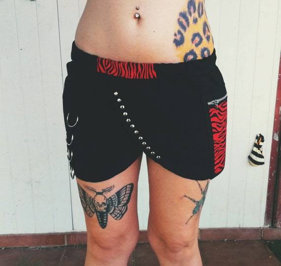 Skirt with 2 pockets with rings. Handcrafted print. Zebra or leopard various colors to choose from. Waistband with custom elastic.
