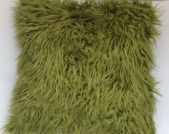 green furry pillow