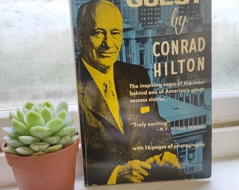 Be My Guest by Conrad N. Hilton. First Edition, 1957 by Prentice Hall Paperback