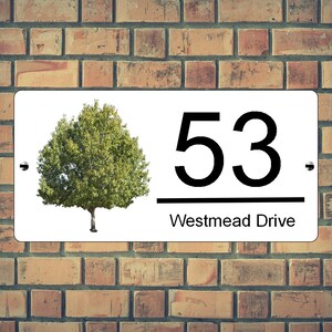 May include: White rectangular house number sign with black text and a green tree image. The number 53 is displayed above the text "Westmead Drive".