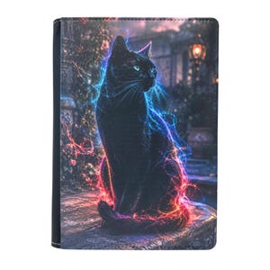 May include: A rectangular protective tablet case featuring a graphic print of a black cat surrounded by swirling blue and red neon energy lines. The cat is sitting on a stone surface with a blurred outdoor garden setting in the background.