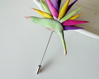 Tropical lapel pin bird of paradise boutonniere