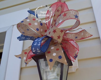 Patriotic 4th of July porch decor is some of my favorite home decor to shop for! Etsy is an especially great spot to find unique decor finds--and that includes patriotic porch decor. These swag bows are such a fun pop of color! 