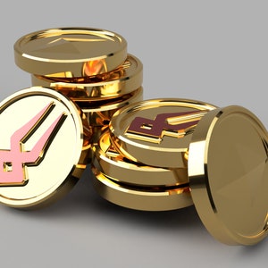 Puede incluir: Una pila de monedas de color dorado con un símbolo de tridente rosa y marrón en la parte delantera. Las monedas están dispuestas en una pila con una moneda tumbada de lado.