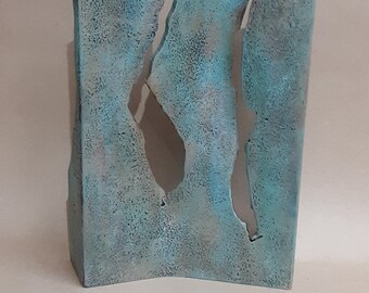 Steel sculpture wiith blue/bronze patina
