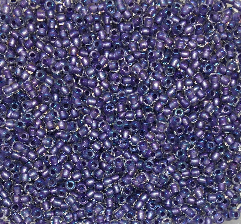 size 110 Toho Japanese Round Seed Beads 110 T265 Toho Metallic Purple Lined Crystal Rainbow Craft supplies 20 grams